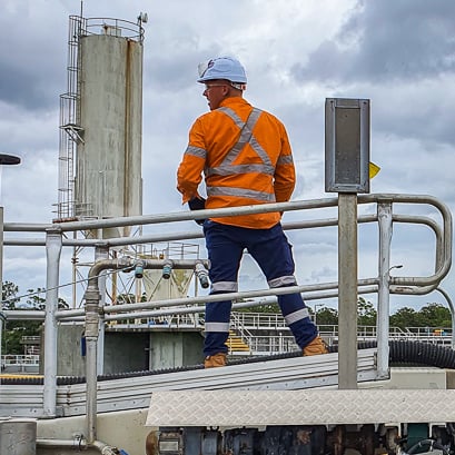 A-PMA-operator-relays-a-message-as-the-crew-cleans-a-wastewater-clarifyer